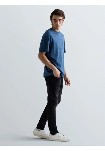 Pantalón Replay Anbass negro, vista en movimiento cuerpo entero Pantalón Replay Anbass negro, vista en movimiento cuerpo entero
