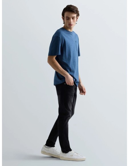 Pantalón Replay Anbass negro, vista en movimiento cuerpo entero