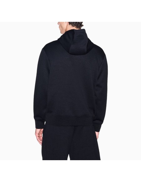 Sudadera Armani Exchange negra - vista trasera en modelo